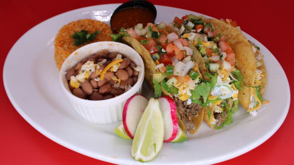 Three (3) Super Crispy Tacos Plate with Rice & Beans · Our Crispy tacos are made with your choice of meat topped with shredded lettuce, cheese, sour cream, and pico de gallo with a side of rice and beans.