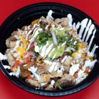 Burrito Bowl · Our version of the naked burrito in a bowl. The meat of choice, rice, beans, cheese, sour cr...