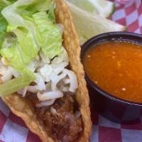 Crispy Taco · Our Crispy Tacos come on a hard shell and are made with your choice of meat topped with shre...