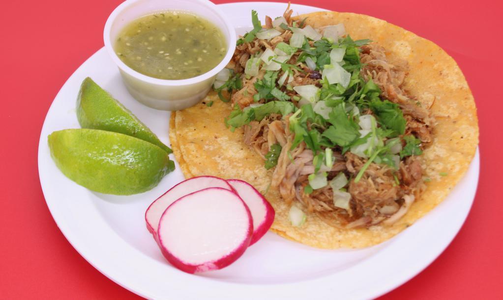 Large Taco: Carnitas (Fried Pork) · A large tortilla with the meat of your choice topped with onions and cilantro.