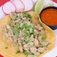 Large Taco: Pollo (Chicken) · A large tortilla with the meat of your choice topped with onions and cilantro.
