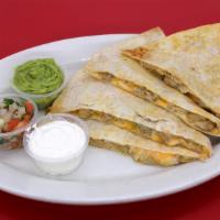 Chicken Super Quesadilla · Your choice of meat on our large flour tortilla with melted cheese served with guacamole, so...