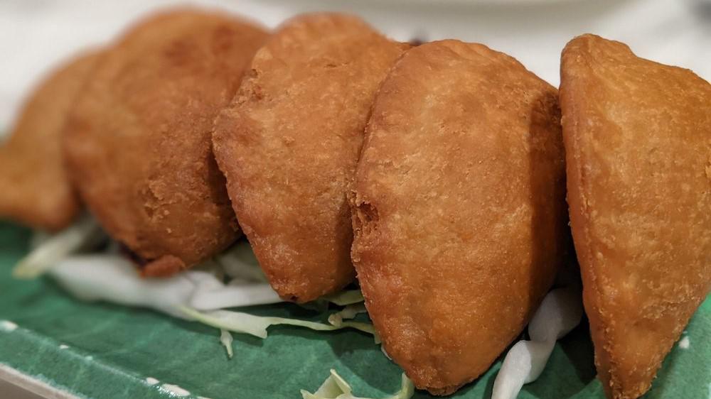 Chicken Empanadas · 5 Pieces of Golden Fried Dough Stuffed with Shredded Chicken Asado