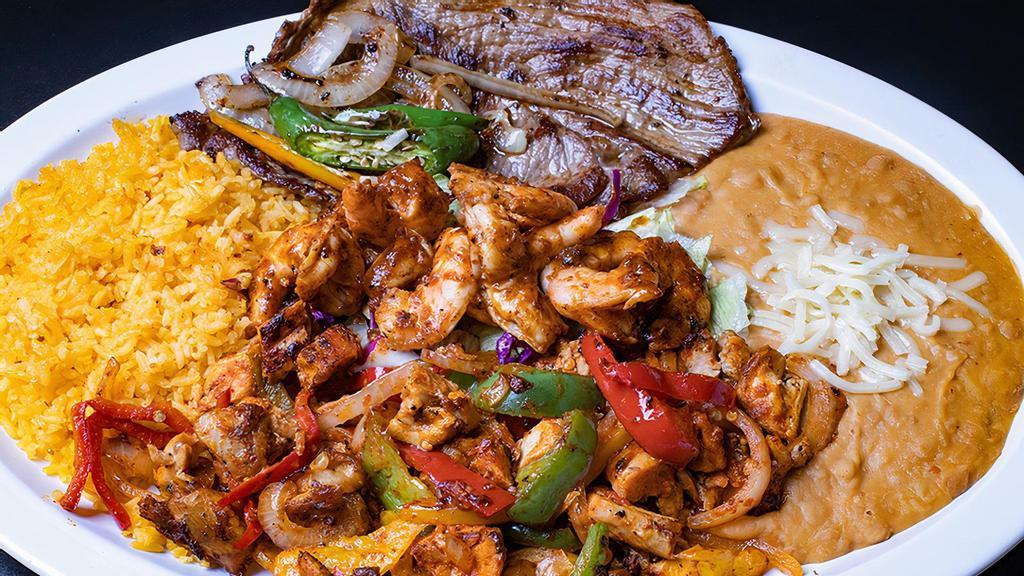 Plato Loco /  Crazy Plate · Rice, beans, steak, chicken fajitas, shrimp & spices.