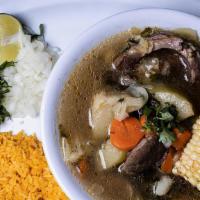 Caldo de Res / Beef Broth · Served with carrots, corn, meat, celery, zucchini, squash, rice and tortillas.