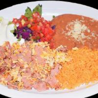 Huevos con Jamon / Eggs with Ham · With rice, beans and salad.