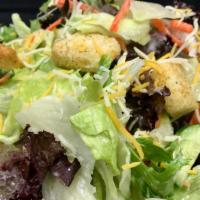 Salad · lettuce, spring mix, onion, carrot, croutons, shredded cheese, tossed with a Japanese miso v...