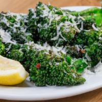 Large Roasted Broccolini · Pecorino romano, fresh garlic, chili flakes, lemon (GF)