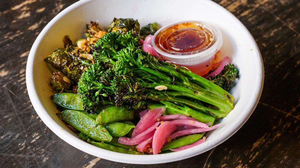 Luau Bowl · brown rice, snap peas, brussel sprouts, broccolini, pickled red onions, nuts 'n' seeds, sweet & spicy Hawaiian sauce (gluten free, vegan)