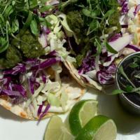 Crispy Fried Baja Fish Tacos · rockfish, flour tortilla, mayo, shredded cabbage, cilantro, salsa cruda (diary free)