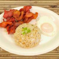 Tosilog · Fried cured pork meat, garlic fried rice and fried egg.