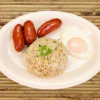 Longsilog · Sweet pork sausage, garlic fried rice and fried egg.