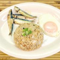 Tuyosilog · Dried salted herring, garlic fried rice and fried egg. Spiced vinegar is perfect condiment f...
