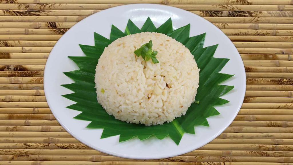 Garlic Fried Rice · Steamed Rice, chopped garlic, salt, pepper and green onions.