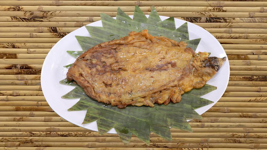 Eggplant Omelette (Available at 8am - 15 min wait) · This is an omelette made by pan frying steamed peeled eggplant soaked in beatered egg.