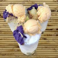 Halo-Halo ea. · This dessert is a mixture of crushed ice, milk, sugar, mango ice cream, flan, purple yam, be...