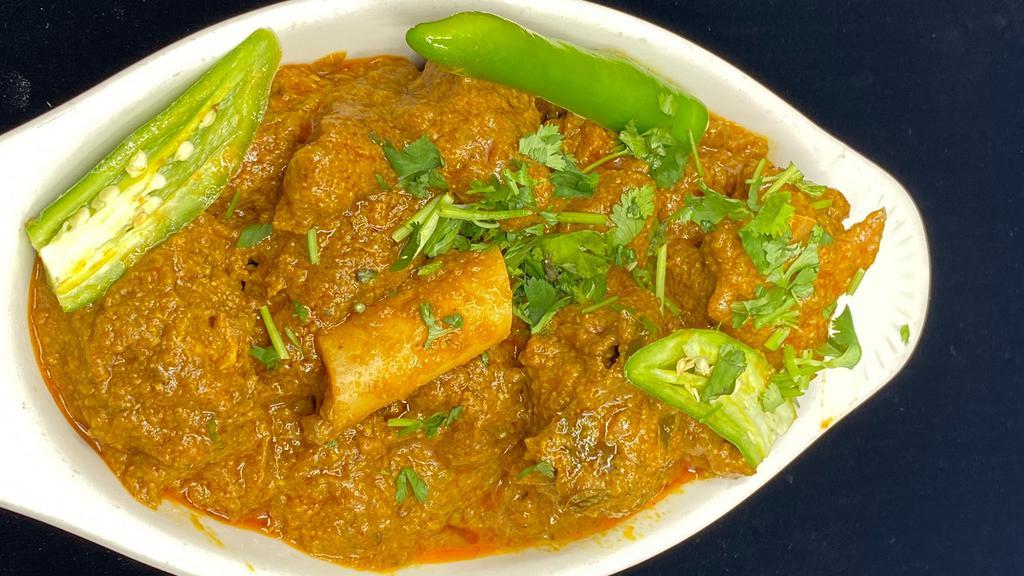 Goat curry · A classic North and South Indian dish baby goat in a cardamom sauce.
