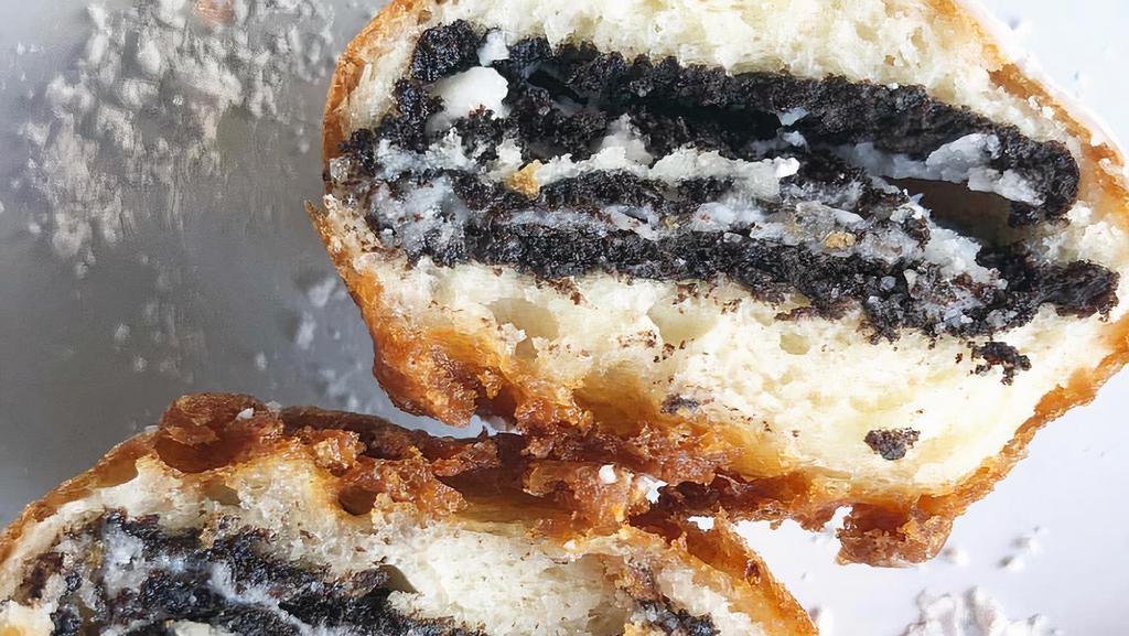 Omg Cookies · 4 double stuffed Oreos battered in krusteaz sweet cream mix, topped with powdered sugar, and a side of chocolate.