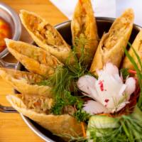 Crispy Spring Rolls (4 Pcs) · Silver noodles, dried mushrooms and cabbage served with sweet and sour sauce.