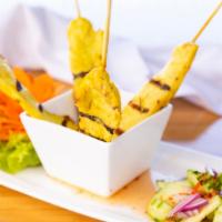 Satay Chicken (4 Pcs) · Contains nuts. Chicken on skewers served with peanut sauce and cucumber salad.