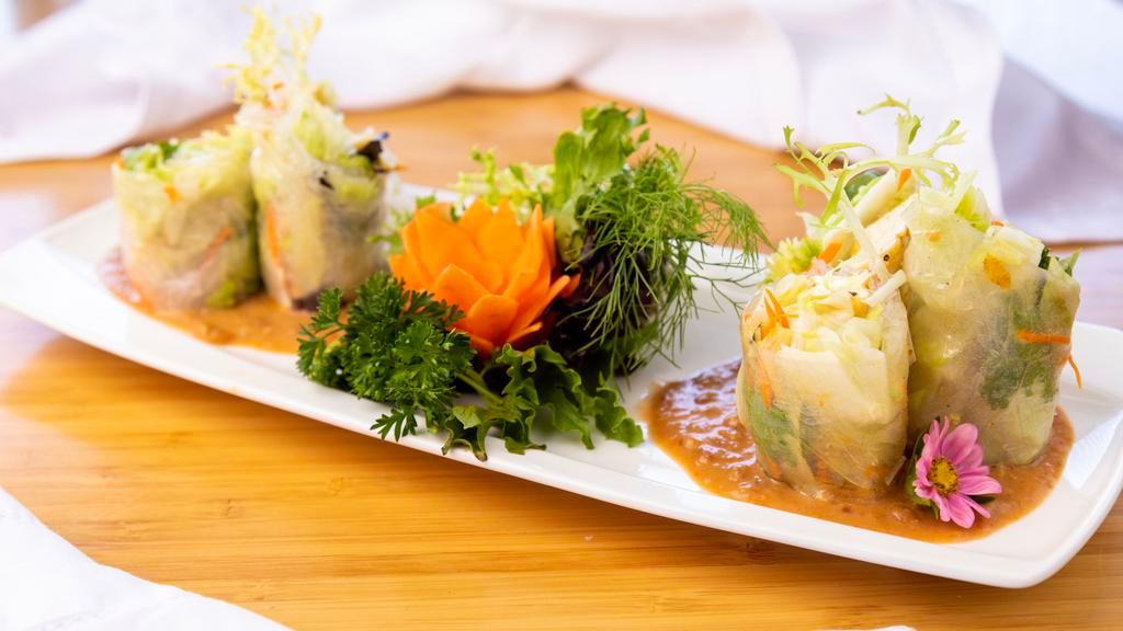 Fresh Salad Rolls · Contains nuts. Prawns, bean sprouts, lettuce and cilantro wrapped in fresh rice paper served with peanut sauce.