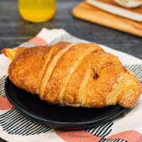 Ham and Cheese Croissant  · Baked ham and cheese filled croissant.
