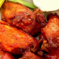 Crispy Chicken Wings · Served with Sweet sriracha flavor. Choice of ranch or blue cheese dressing.