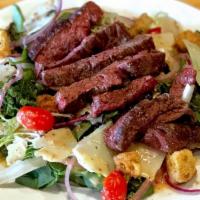 Grilled Steak Salad
 · Grilled skirt steak, mixed greens, tomato, red onion, croutons, Parmesan, red wine vinaigret...