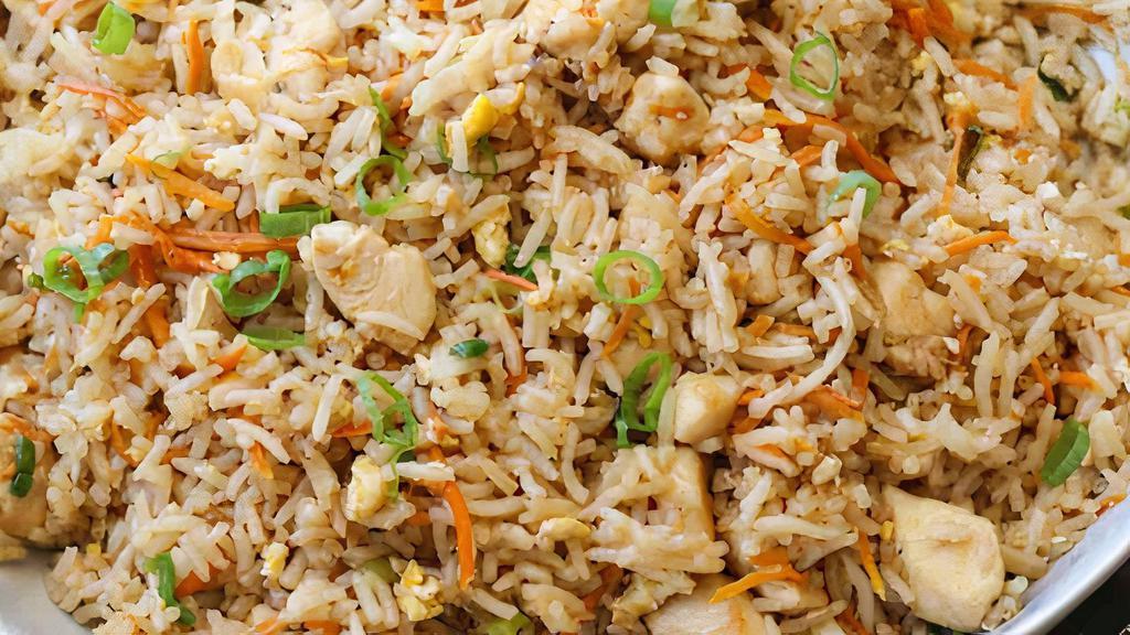 Chicken Fried Rice · Indo-Chinese style fried rice tossed with vegetables and chicken.