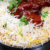 Ulavacharu Chicken Biryani · Aromatic Basmati rice made with Indian herbs served over succulent pieces of chicken cooked ...