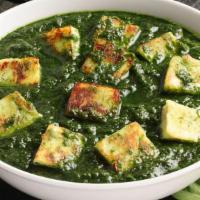 Palak Paneer · Cottage cheese cooked with blended Indian spices and spinach sauce.