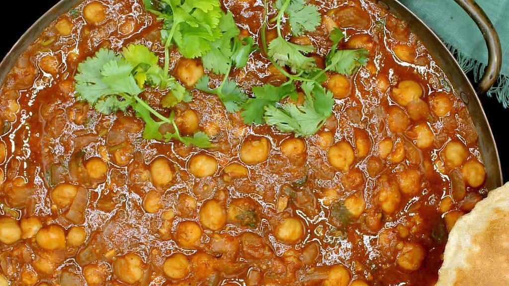 Chana Masala · Chickpeas/Garbanzo seeds cooked with mildly spiced sauce.