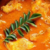 Fish Curry · Fish Cooked in house special masala sauce.
