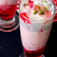 Chicoo's Special Falooda · Flavorful drink made with thin Sev, basil seeds, rose milk and topped with ice cream.