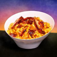 BBQ Mac and Cheese · Classic mac and cheese with sliced grilled chicken, BBQ sauce, bacon bits, and scallions.