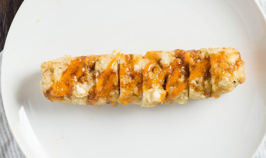 Golden California Roll · Deep fried California roll with unagi sauce and spicy mayo.