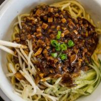 Zha Jiang Noodle炸酱面 · Beijing style noodle mix with bean paste.
serves with beans sprouts and cucumber