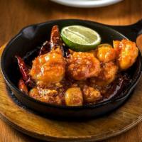 Skillet Shrimp (8 Pieces) · Gluten-Free. Garlic, ginger, chili, and shrimp served sizzling on a hot skillet.