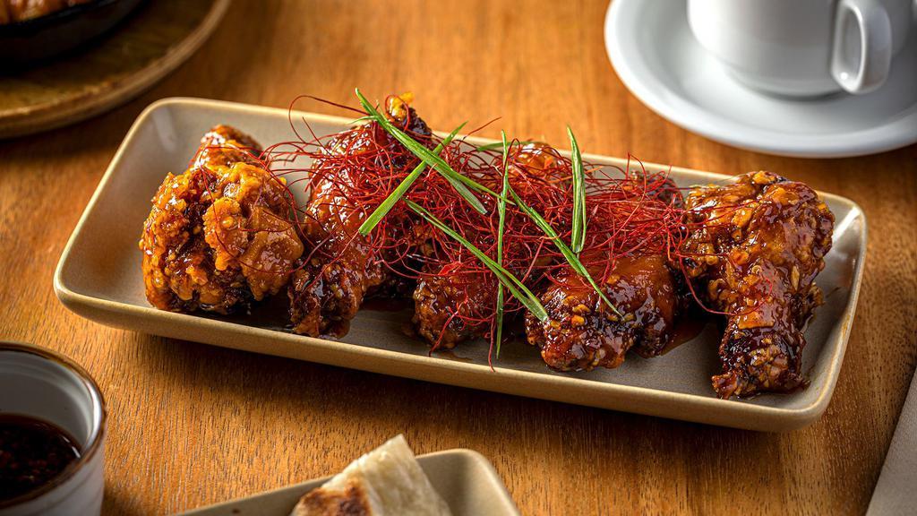 Chicken Wings · Delicious, fried chicken wings served with your choice of seasoning.