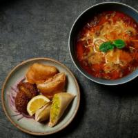 Vegetarian Samusa Soup · Vegan. A popular comfort dish from Burma. A hearty soup served with vegetarian samusas, fala...