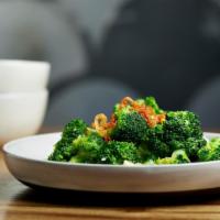 Wok-Tossed Broccoli · Gluten-Free and Vegan. Crown cut broccoli wok-tossed with wine, garlic, and topped with frie...