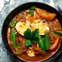 Burmese Curry · Gluten-Free. Burmese style red curry served with choice of your vegetables.