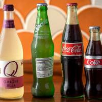 Non-Alcholic Beverages · 12oz Bottled. Your choice of San Pellegrino Sparkling Water, Bottled Coke, Bottled Sprite, o...