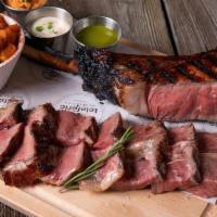 Catalan Tomahawk · Premium 'chuletón', potatoes and set of dressings (gfa) Allow 45 minutes to cook