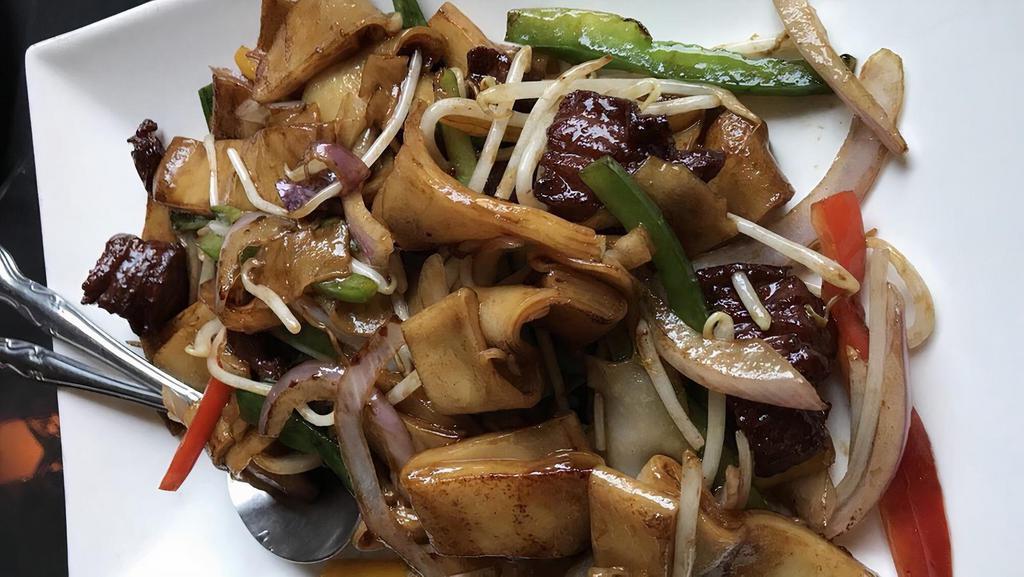 Beef Chow Fun · Fresh flat rice noodles/ bell peppers/ scallions/ sprouts / x. o. demi sauce.