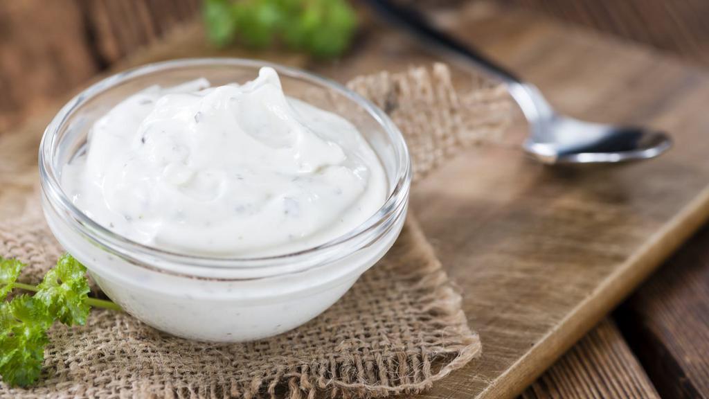 Sour Cream · Chilled sour cream on the side, served in a 2 oz container.