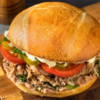 Torta De Asada · Soft, bolillo roll filled with tender, marinated grilled beef, fresh lettuce, tomato and oni...