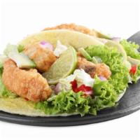Taco Salad with Pescado (Tilapia) · Fresh Taco salad made with Tilapia, rice, beans, lettuce, tomatoes, cucumbers, cheese, guaca...