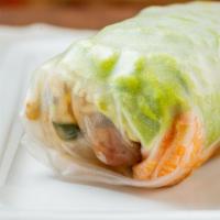 Tofu Korean Wrap · Chili garlic tofu, rice paper, kimchi rice, cucumbers, pickled vegetables, marinated beanspr...