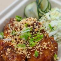 Korean Fried Chicken Wings · 6pc, sweet and spicy fried chicken wings, slaw, pickled cucumbers, peanuts, scallions
